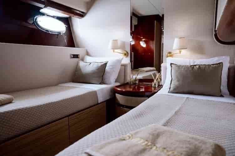 single beds, yacht bedroom, motor yacht in Cyclades